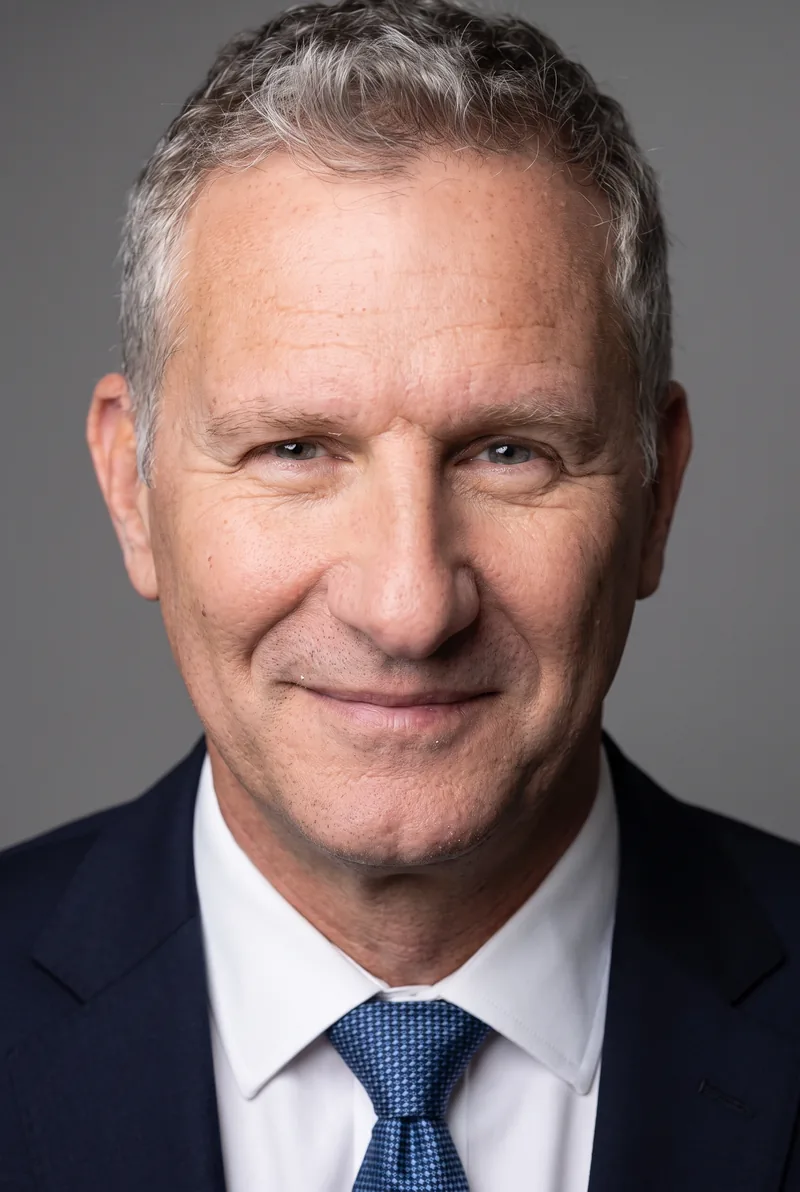 AI-generated portrait of Adam Hills, keynote speaker