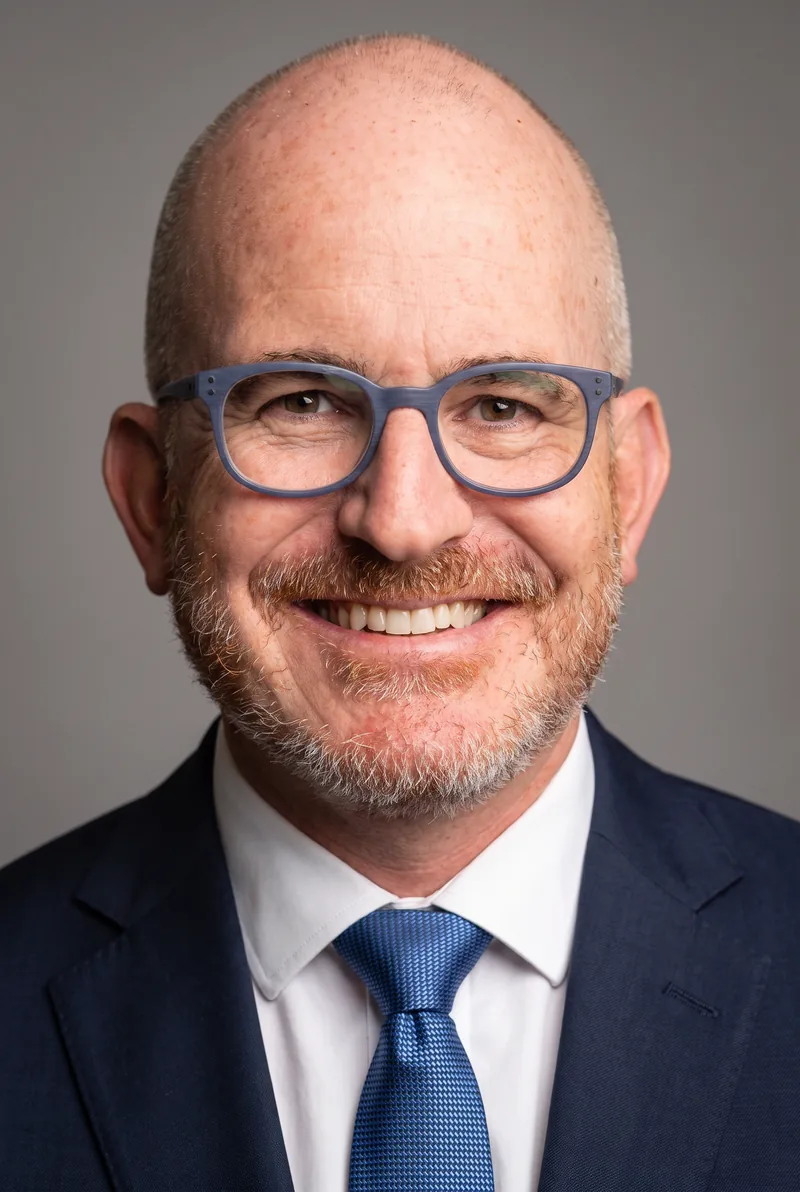 AI-generated portrait of Andrew Klein, keynote speaker