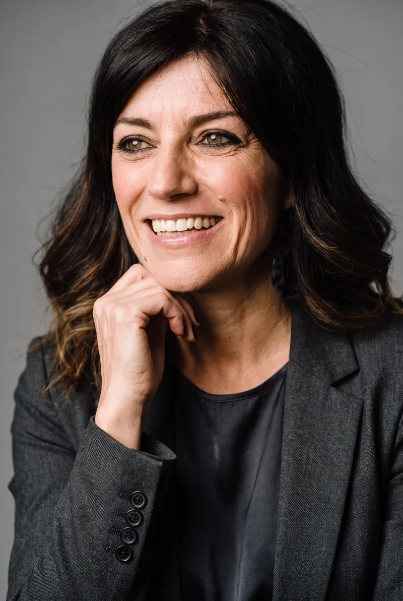 AI-generated portrait of Angela Pippos, keynote speaker