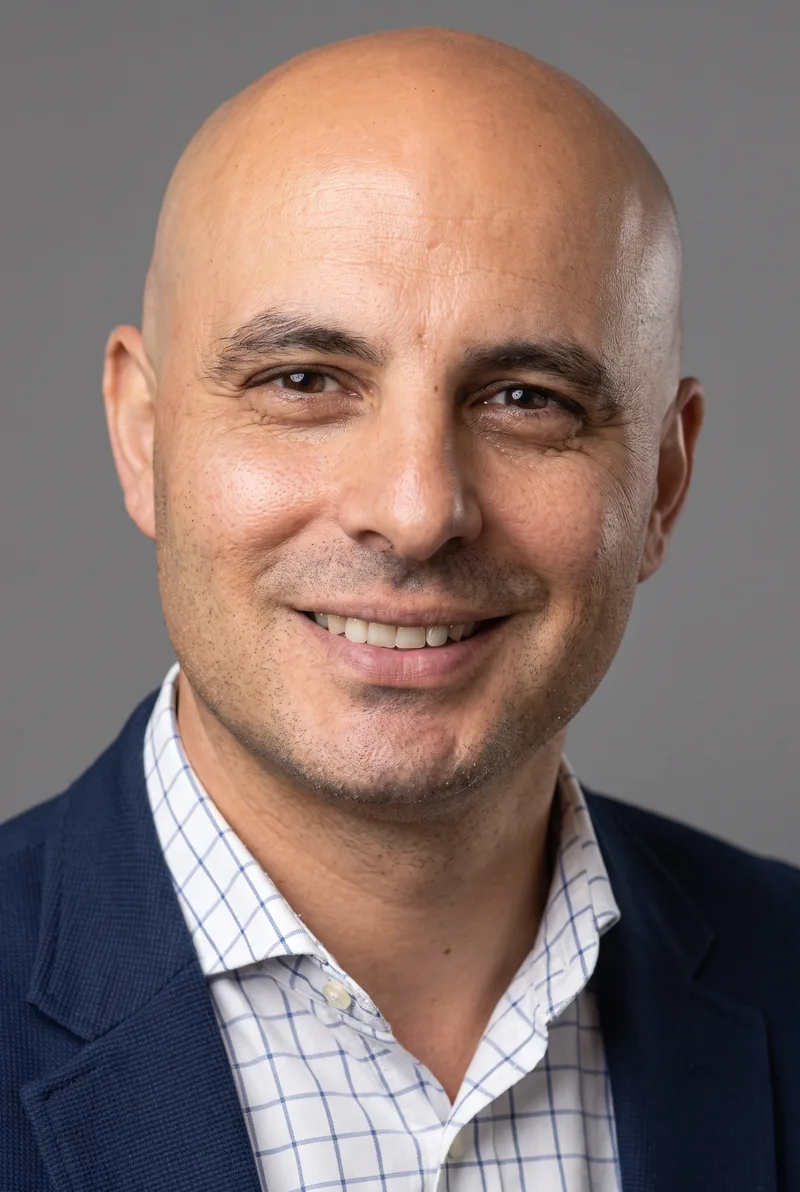 AI-generated portrait of Bill Nikolouzakis, keynote speaker