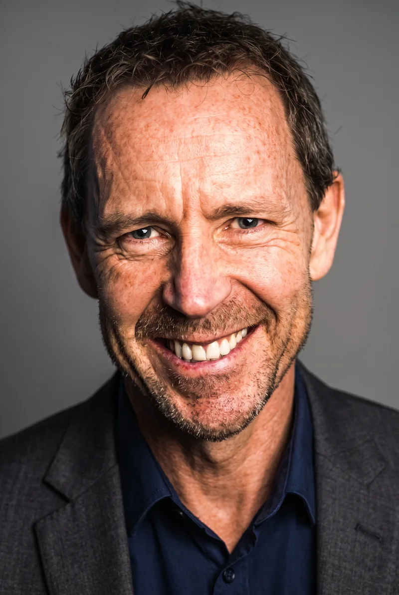 AI-generated portrait of Cameron Schwab, keynote speaker