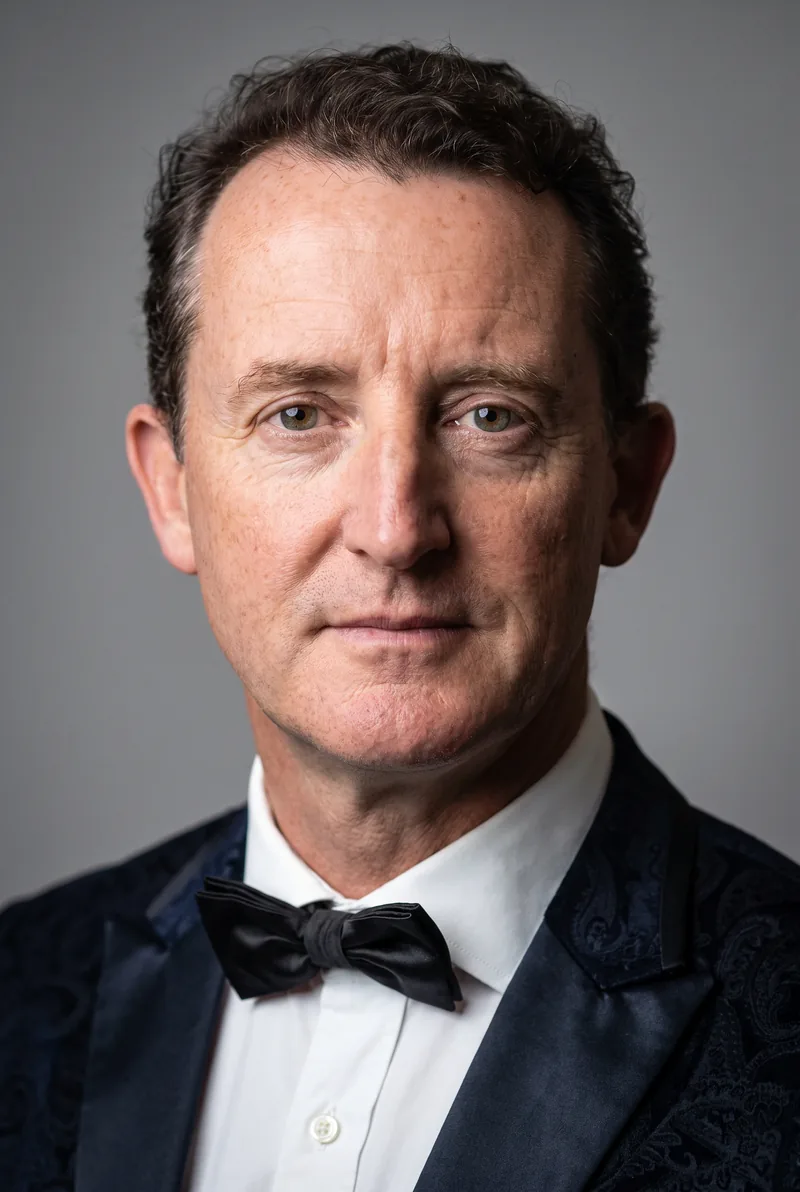 AI-generated portrait of Col Cameron, keynote speaker