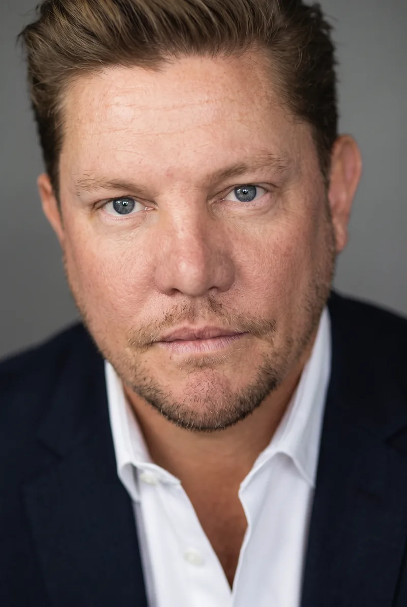 AI-generated portrait of Damien Thomlinson, keynote speaker