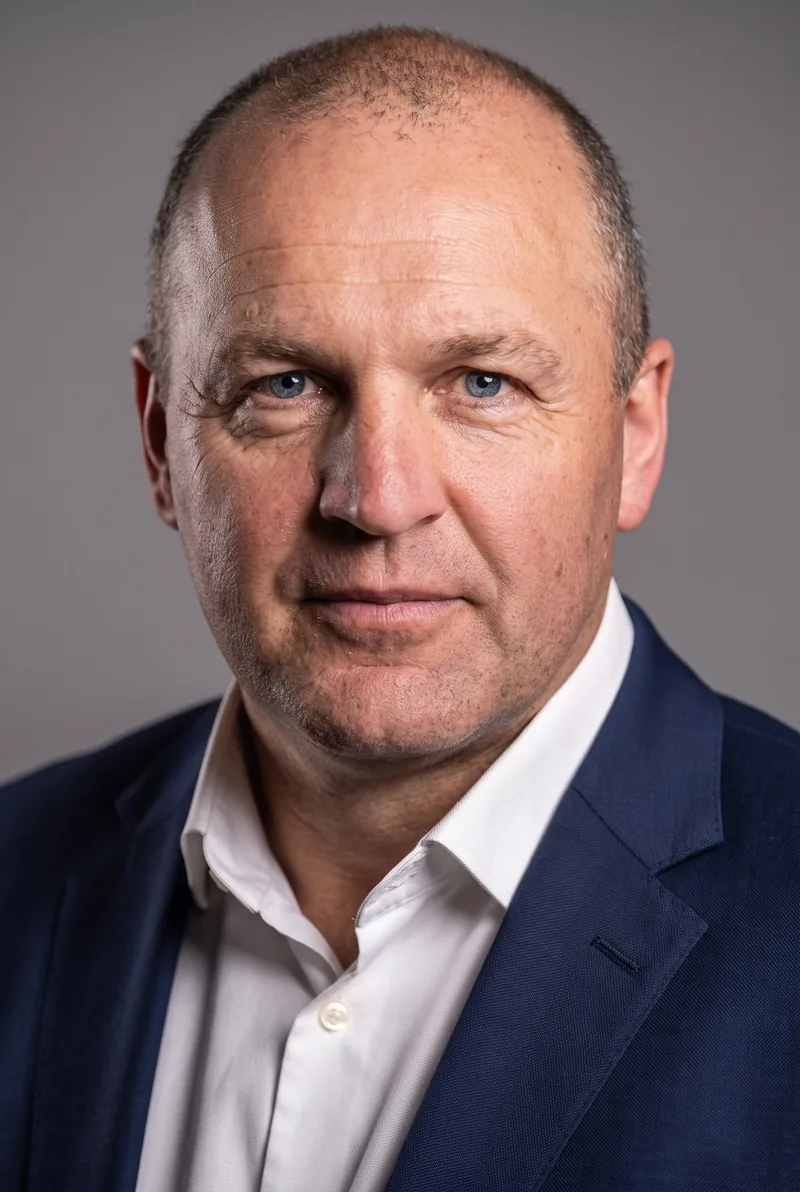 AI-generated portrait of Dan Collins, keynote speaker