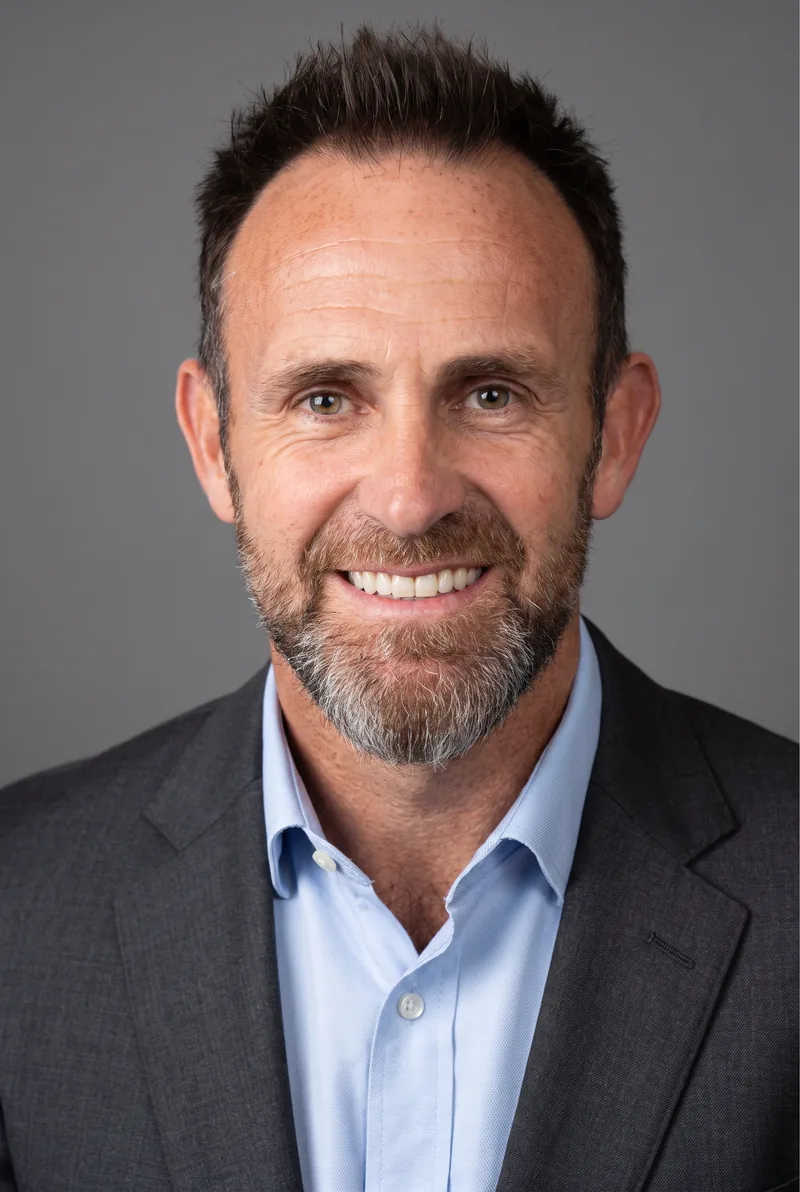 AI-generated portrait of Derek Percival, keynote speaker