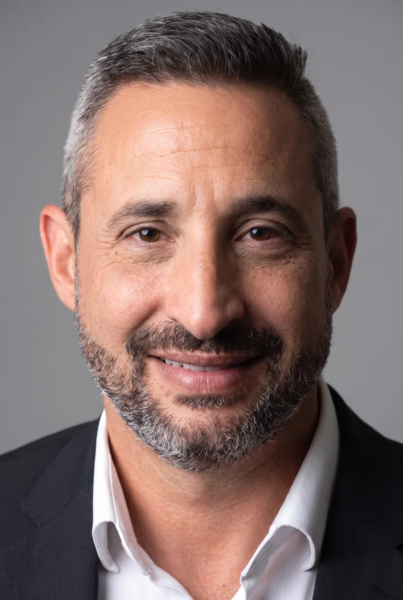 AI-generated portrait of Dr Gav Schneider, keynote speaker