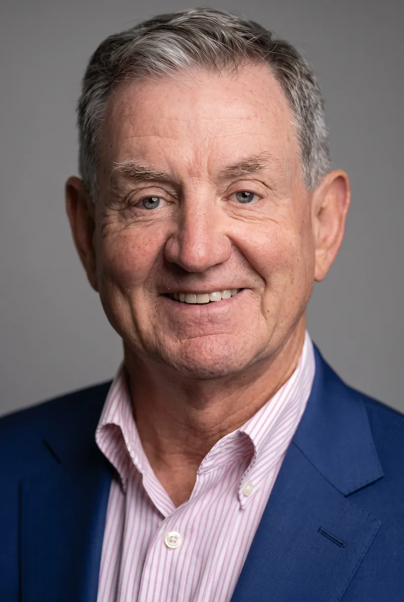 AI-generated portrait of Dr Peter Larkins, keynote speaker