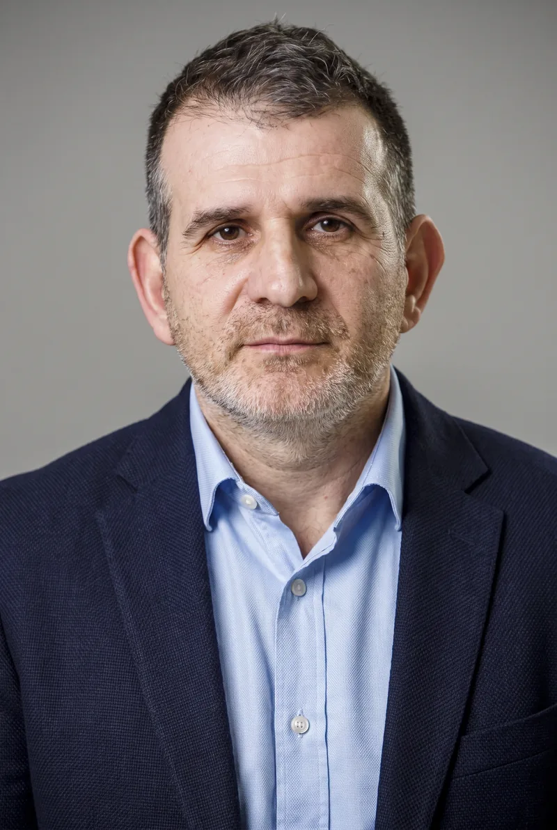 AI-generated portrait of George Halkias, keynote speaker