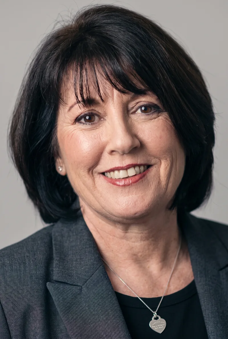 AI-generated portrait of Kathy Kelly, keynote speaker