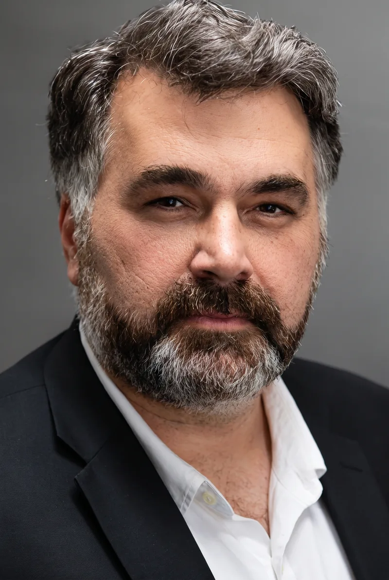 AI-generated portrait of Kon Karapanagiotidis OAM, keynote speaker