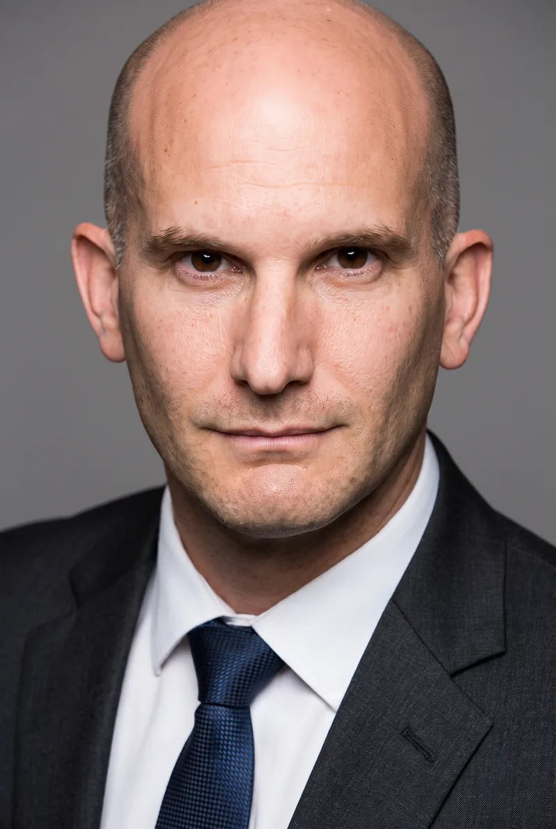 AI-generated portrait of Leon Logothetis, keynote speaker