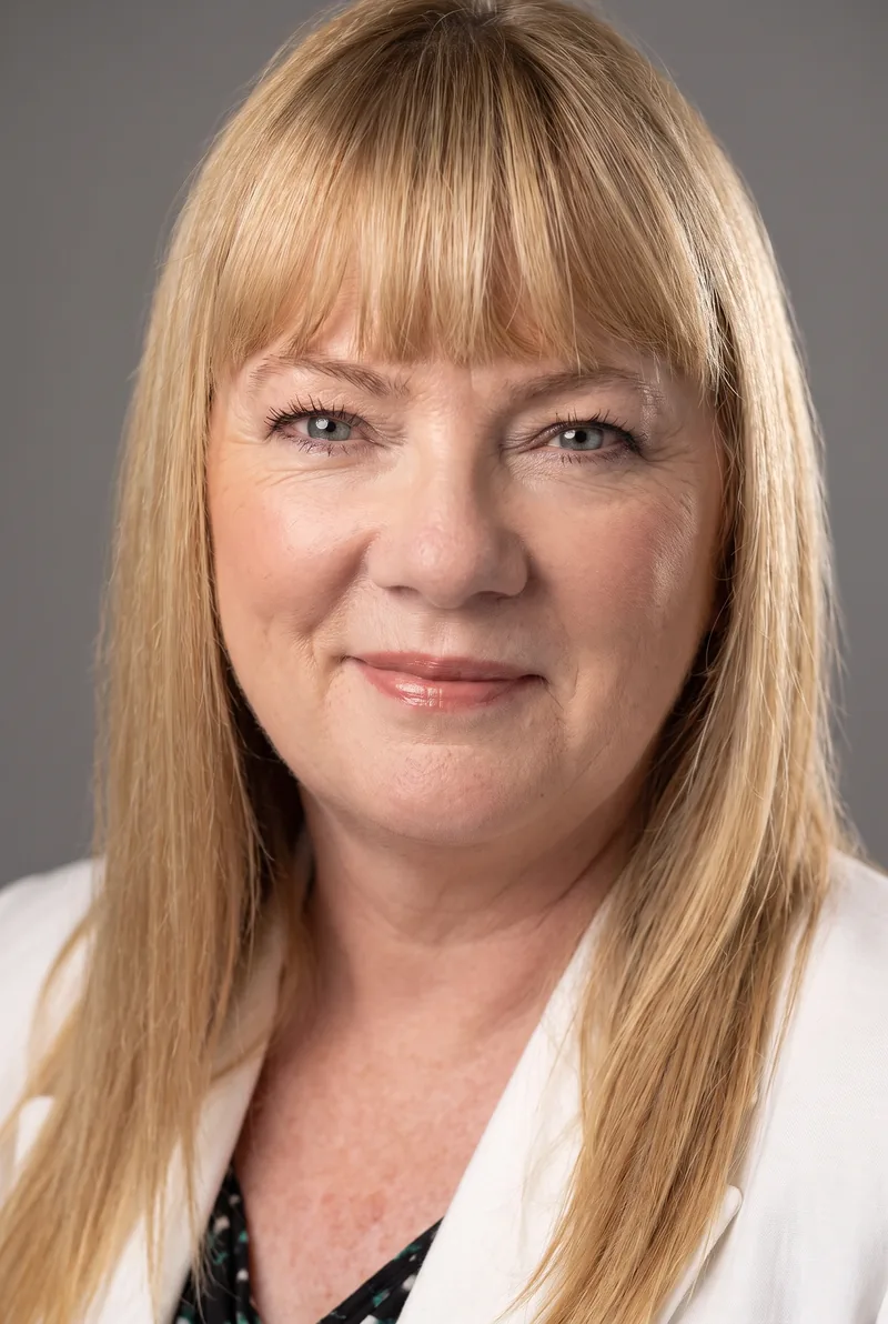 AI-generated portrait of Liz Courtney, keynote speaker