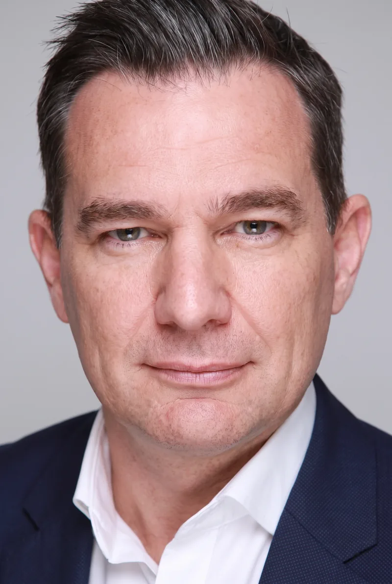 AI-generated portrait of Mark Stuart, keynote speaker