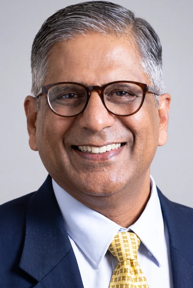 AI-generated portrait of Mukul Deva, keynote speaker