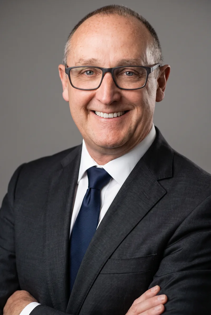 AI-generated portrait of Nigel Collin, keynote speaker