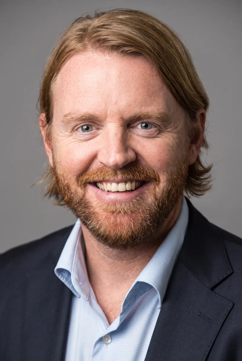 AI-generated portrait of Patrick Hollingworth, keynote speaker