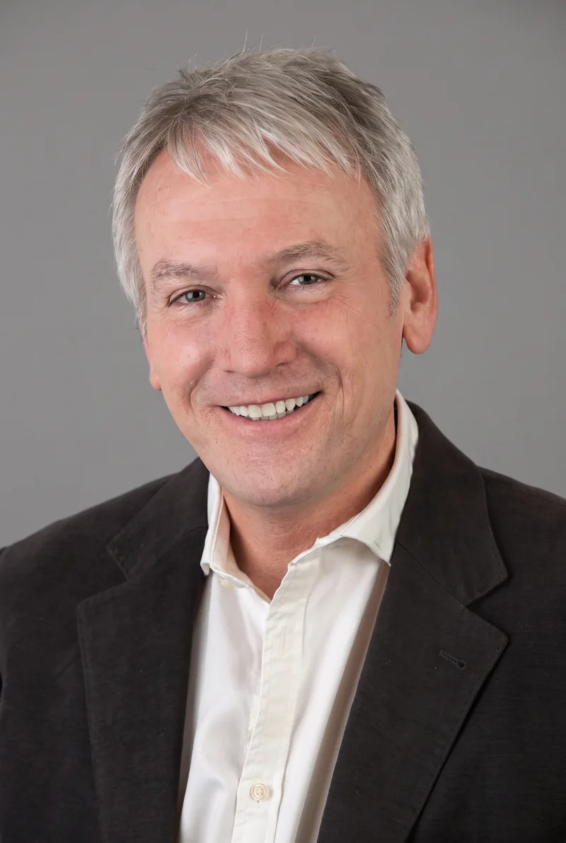 AI-generated portrait of Peter Thompson, keynote speaker
