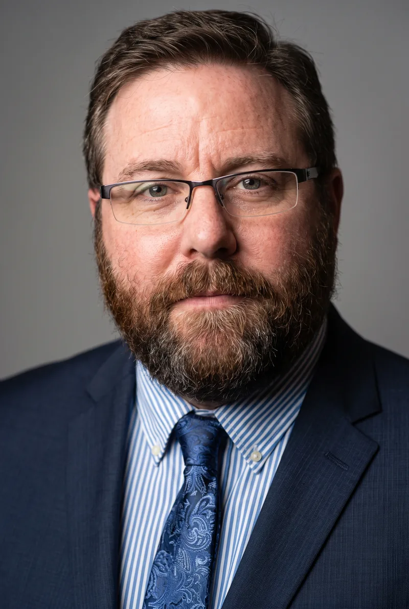 AI-generated portrait of Shane Jacobson, keynote speaker