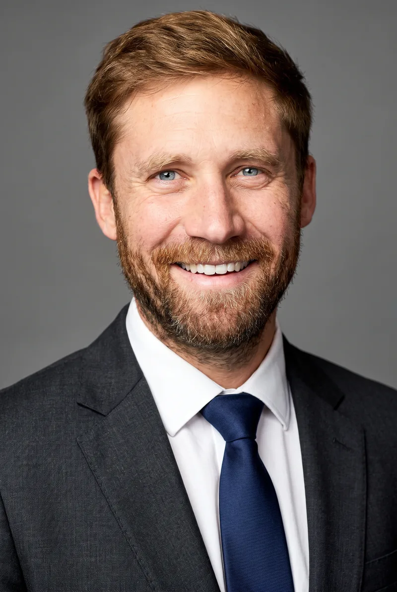 AI-generated portrait of Simon Griffiths, keynote speaker