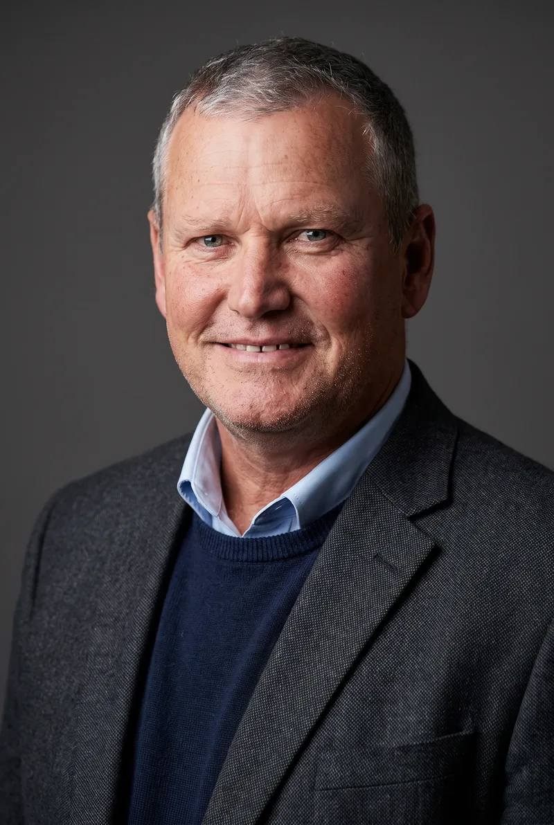 AI-generated portrait of Tim Gilbert, keynote speaker