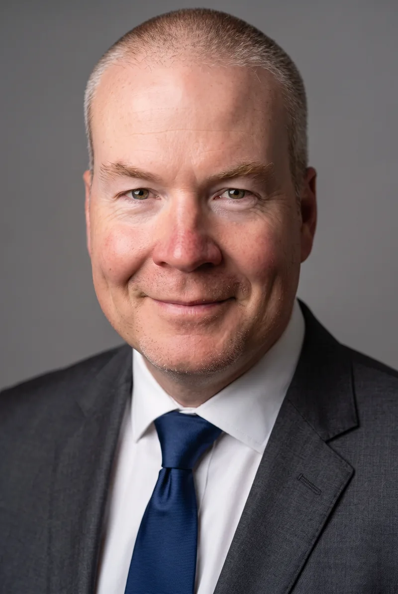 AI-generated portrait of Tim Gill, keynote speaker