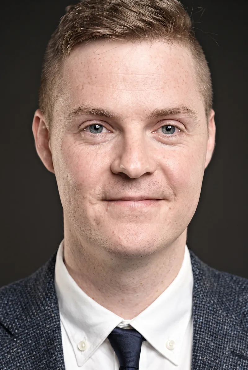 AI-generated portrait of Tom Ballard, keynote speaker