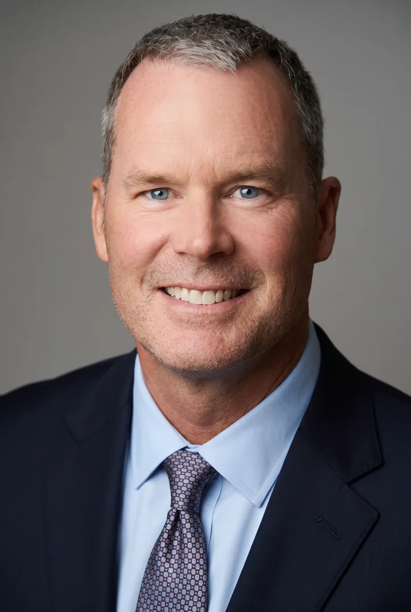 AI-generated portrait of Tom Williams, keynote speaker